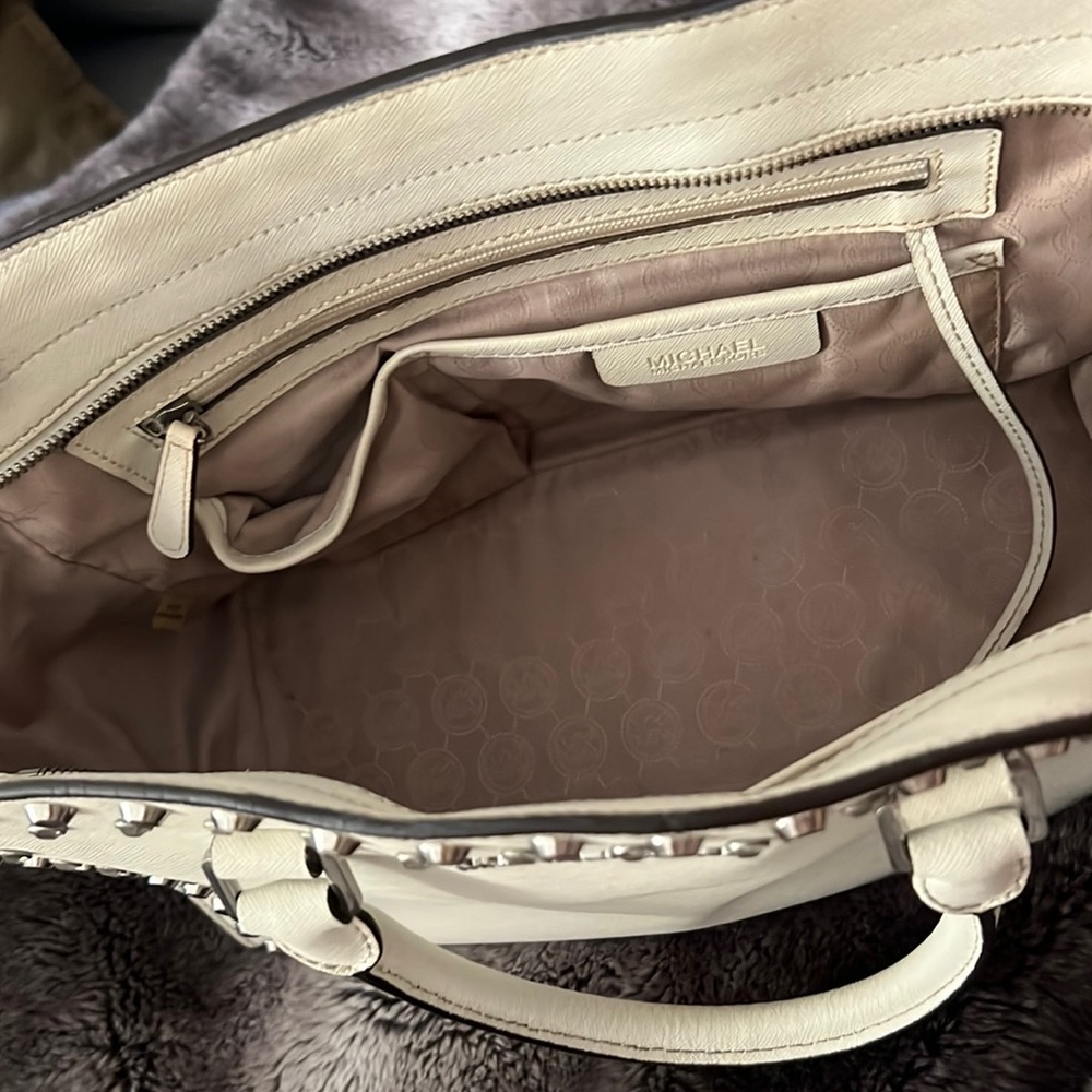 Michael Kors White leather studded handbag.